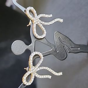 Silver bow earrings